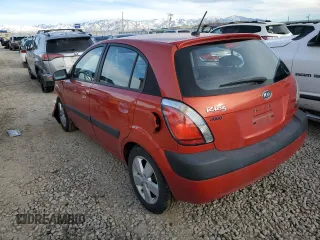 2009 Kia Rio LX with VIN KNADE243X96587429, listed as a Copart auction lot 46500825 with 116,557 mi miles and Salvage Title. Bid and sale history available at carsss.com. Image 2.