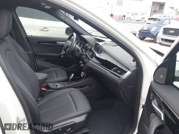 2021 BMW X1 xDrive28i with VIN WBXJG9C01M5S06181, listed as a IAAI auction lot 42292167 with 55,966 mi miles and . Bid and sale history available at DreamBid. Image 5.