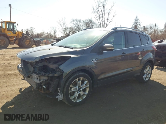 2016 Ford Escape Titanium with VIN 1FMCU9JX5GUA65412, listed as a IAAI auction lot 41859123 with 80,208 mi miles and . Bid and sale history available at DreamBid. Image 2.