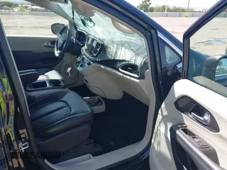 2023 Chrysler Pacifica Touring L with VIN 2C4RC1BG9PR628170, listed as a IAAI auction lot 42515590 with 41,987 mi miles and . Bid and sale history available at DreamBid. Image 5.