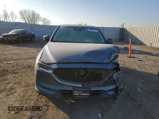 2020 Mazda CX-5 Grand Touring with VIN JM3KFBDM1L0727482, listed as a Copart auction lot 82976114 with 103,707 mi miles and Salvage Title. Bid and sale history available at carsss.com. Image 5.
