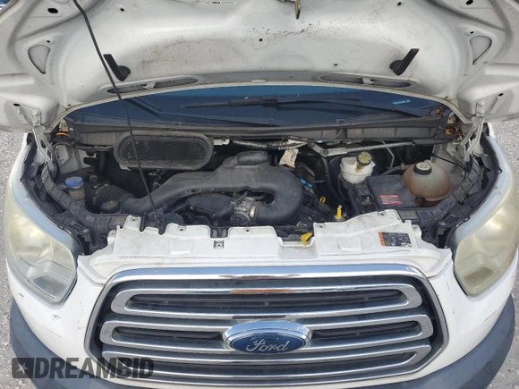 2015 Ford Transit Cargo with VIN 1FTNR1ZM8FKA33669, listed as a Copart auction lot 63588345 with 86,260 mi miles and Salvage title. Bid and sale history available at DreamBid. Image 12.