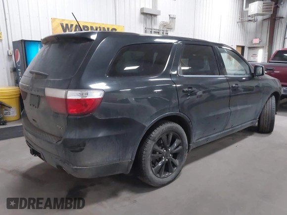 2013 Dodge Durango R/T z VIN 1C4SDJCT4DC670406, wystawiony jako IAAI lot #41685272 z przebiegiem 230 767 mil mil oraz . Historia ofert i sprzedaży dostępna na DreamBid. Obrazek 4.