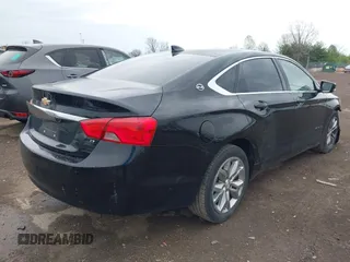 2017 Chevrolet Impala LT with VIN 1G1105S3XHU158948, listed as a IAAI auction lot 42036010 with 121,996 mi miles and . Bid and sale history available at DreamBid. Image 4.