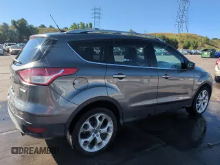 2013 Ford Escape Titanium with VIN 1FMCU0J93DUA78278, listed as a Copart auction lot 63519845 with 141,874 mi miles and Salvage title. Bid and sale history available at DreamBid. Image 3.