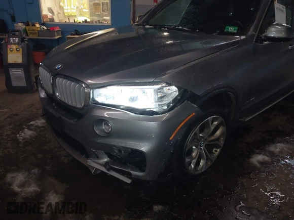 2018 BMW X5 xDrive35i with VIN 5UXKR0C53J0Y03214, listed as a IAAI auction lot 41509082 with 92,552 mi miles. Bid and sale history available at carsss.com. Image 6.