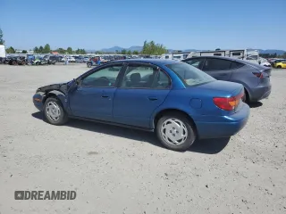 2001 Saturn SL z VIN 1G8ZK547X1Z294553, wystawiony jako Copart lot #53786805 z przebiegiem 288 011 mil mil oraz Szkody całkowita. Historia ofert i sprzedaży dostępna na DreamBid. Obrazek 2.