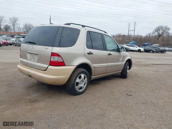 2004 Mercedes-Benz M-Class 3.5L with VIN 4JGAB57E44A463493, listed as a IAAI auction lot 41769962 with NaN miles. Bid and sale history available at carsss.com. Image 4.