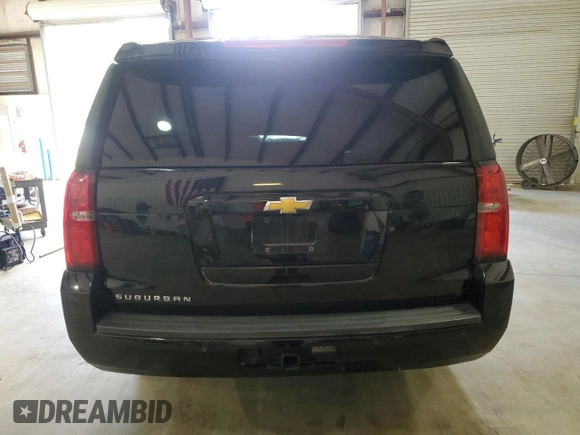 2018 Chevrolet Suburban LS z VIN 1GNSCGEC3JR140303, wystawiony jako Copart lot #69944234 z przebiegiem 48 541 mil mil oraz Szkoda całkowita • Salvage title. Historia ofert i sprzedaży dostępna na DreamBid. Obrazek 6.