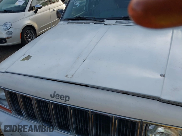 2000 Jeep Cherokee Limited with VIN 1J4FF68S3YL112376, listed as a IAAI auction lot 41946899 with 208,228 mi miles. Bid and sale history available at carsss.com. Image 10.