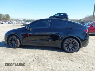 2021 Tesla Model Y Performance with VIN 5YJYGDEF6MF252877, listed as a IAAI auction lot 41770770 with 58,550 mi miles and . Bid and sale history available at DreamBid. Image 14.
