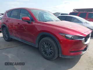 2017 Mazda CX-5 Touring with VIN JM3KFACL3H0195212, listed as a IAAI auction lot 42041361 with 57,377 mi miles and . Bid and sale history available at carsss.com. Image 1.