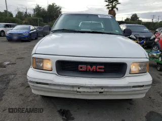 1997 GMC Sonoma SLS with VIN 1GTCS19X2V8516379, listed as a Copart auction lot 84080794 with 257,607 mi miles and Salvage Title. Bid and sale history available at carsss.com. Image 5.