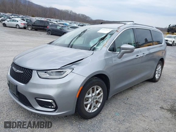 2021 Chrysler Pacifica Touring L with VIN 2C4RC1BG3MR542543, listed as a IAAI auction lot 41657073 with 118,833 mi miles and . Bid and sale history available at DreamBid. Image 6.