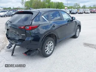 2024 Mazda CX-5 S Select with VIN JM3KFBBL1R0503003, listed as a IAAI auction lot 42149860 with 23,133 mi miles and . Bid and sale history available at DreamBid. Image 4.