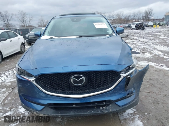 2020 Mazda CX-5 Grand Touring with VIN JM3KFBDM2L0778831, listed as a IAAI auction lot 41739655 with 72,533 mi miles. Bid and sale history available at carsss.com. Image 13.