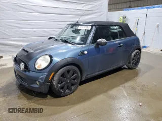 2010 MINI Convertible S z VIN WMWMS3C52ATY50861, wystawiony jako Copart lot #55620135 z przebiegiem 214 734 mil mil oraz Szkoda całkowita • Salvage title. Historia ofert i sprzedaży dostępna na DreamBid. Obrazek 1.