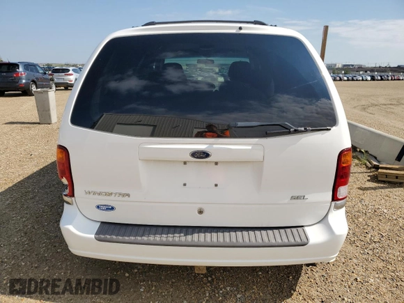 2001 Ford Windstar SEL with VIN 2FMDA56461BA55148, listed as a Copart auction lot 66531405 with 74,409 mi miles and Salvage title. Bid and sale history available at DreamBid. Image 6.