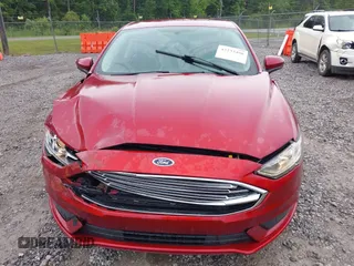 2017 Ford Fusion Hybrid SE with VIN 3FA6P0LU1HR238283, listed as a IAAI auction lot 42233496 with 123,452 mi miles and . Bid and sale history available at DreamBid. Image 6.