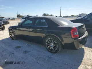 2010 Chrysler 300 with VIN 2C3CA2CV0AH279836, listed as a Copart auction lot 81843694 with 128,515 mi miles and Salvage Title. Bid and sale history available at carsss.com. Image 2.