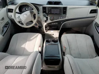 2014 Toyota Sienna LE with VIN 5TDJK3DC7ES073648, listed as a Copart auction lot 50554095 with 136,236 mi miles and Salvage Title. Bid and sale history available at DreamBid. Image 8.