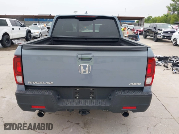 2023 Honda Ridgeline RTL with VIN 5FPYK3F58PB047099, listed as a IAAI auction lot 42313390 with Not provided miles and . Bid and sale history available at DreamBid. Image 17.