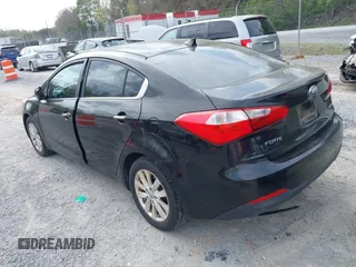 2014 Kia Forte EX with VIN KNAFX4A86E5049938, listed as a IAAI auction lot 42038755 with 82,016 mi miles. Bid and sale history available at carsss.com. Image 3.