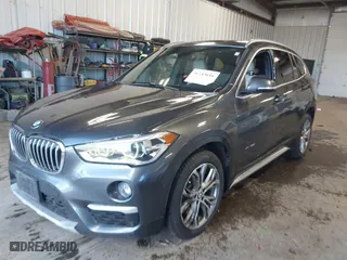 2016 BMW X1 xDrive28i with VIN WBXHT3C3XGP885359, listed as a IAAI auction lot 41743616 with 44,436 mi miles. Bid and sale history available at carsss.com. Image 2.