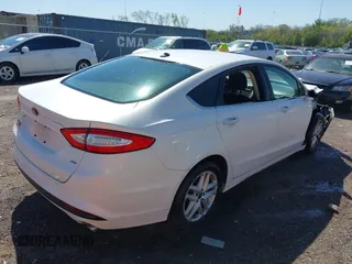 2016 Ford Fusion SE with VIN 3FA6P0H79GR165486, listed as a IAAI auction lot 42052490 with 141,927 mi miles. Bid and sale history available at carsss.com. Image 4.