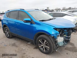 2018 Toyota RAV4 XLE with VIN JTMWFREV0JD128329, listed as a IAAI auction lot 41487410 with NaN miles. Bid and sale history available at carsss.com. Image 1.
