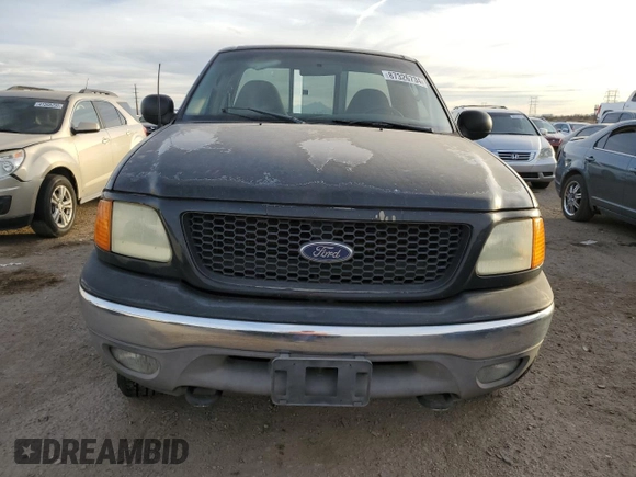 2004 Ford F-150 with VIN 2FTRF08W74CA53629, listed as a Copart auction lot 87326734 with 229,631 mi miles and Salvage title. Bid and sale history available at DreamBid. Image 5.