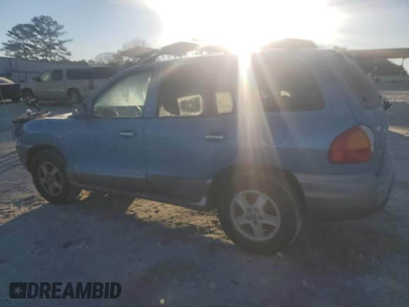 2003 Hyundai Santa Fe GLS with VIN KM8SC13E03U552538, listed as a Copart auction lot 88900865 with 250,847 mi miles and Salvage Title. Bid and sale history available at carsss.com. Image 2.