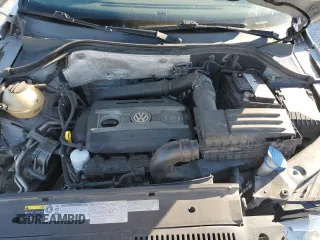 2014 Volkswagen Tiguan SE z VIN WVGAV3AXXEW502310, wystawiony jako Copart lot #42095985 z przebiegiem 130 033 mil mil oraz Szkoda całkowita • Salvage title. Historia ofert i sprzedaży dostępna na DreamBid. Obrazek 14.