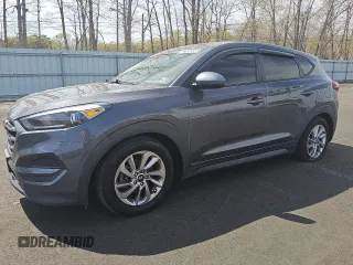 2018 Hyundai Tucson SE z VIN KM8J2CA49JU792947, wystawiony jako Copart lot #52633895 z przebiegiem 75 690 mil mil oraz Tytuł czysty. Historia ofert i sprzedaży dostępna na DreamBid. Obrazek 1.
