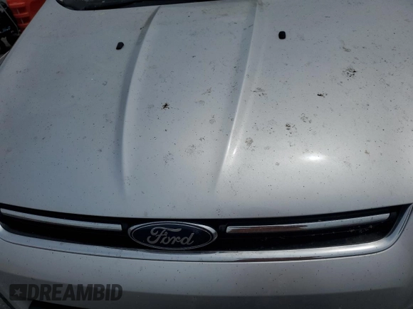 2013 Ford Escape Titanium with VIN 1FMCU9J9XDUB88989, listed as a Copart auction lot 64994445 with 192,833 mi miles and Salvage title. Bid and sale history available at DreamBid. Image 11.