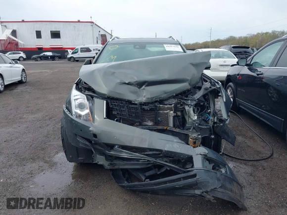 2013 Cadillac SRX Luxury Collection z VIN 3GYFNCE34DS550410, wystawiony jako IAAI lot #41917636 z przebiegiem 66 437 mil mil oraz . Historia ofert i sprzedaży dostępna na DreamBid. Obrazek 12.