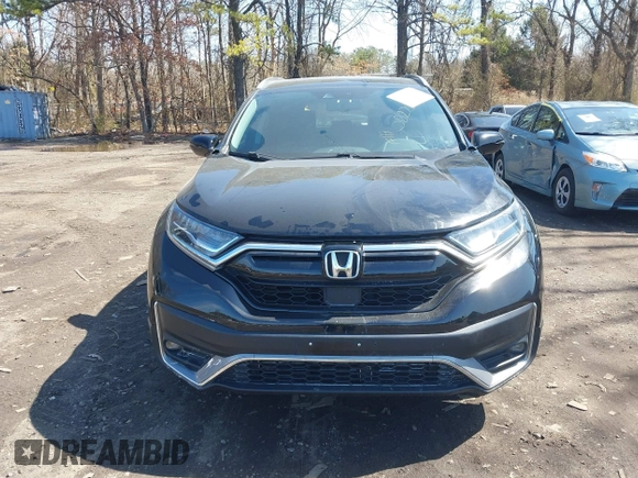 2020 Honda CR-V Touring with VIN 2HKRW2H98LH660573, listed as a IAAI auction lot 41524610 with 37,493 mi miles and . Bid and sale history available at DreamBid. Image 12.