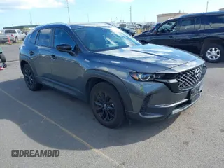 2024 Mazda CX-50 2.5 S Premium Package with VIN 7MMVABDM4RN186802, listed as a IAAI auction lot 41326266 with 7,056 mi miles. Bid and sale history available at carsss.com. Image 1.
