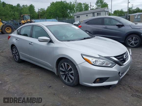 2017 Nissan Altima S z VIN 1N4AL3AP2HC239414, wystawiony jako IAAI lot #42300339 z przebiegiem 98 643 mil mil oraz . Historia ofert i sprzedaży dostępna na DreamBid. Obrazek 1.