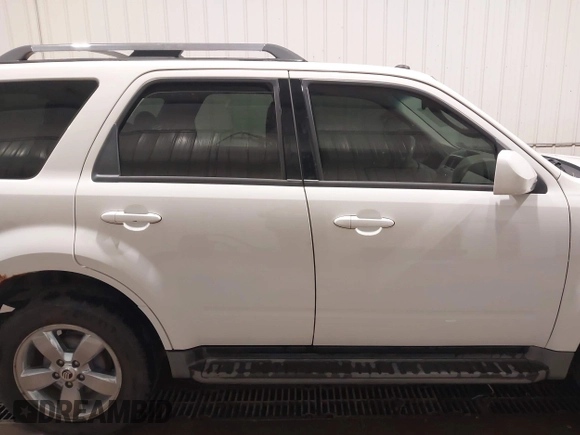 2011 Mercury Mariner Premier with VIN 4M2CN9HG3BKJ02026, listed as a IAAI auction lot 40254703 with 99,000 mi miles and . Bid and sale history available at DreamBid. Image 13.
