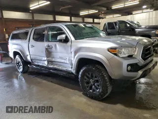 2021 Toyota Tacoma 4WD SR5 with VIN 3TMDZ5BN3MM103509, listed as a Copart auction lot 48461875 with 54,566 mi miles and Salvage Title. Bid and sale history available at carsss.com. Image 4.