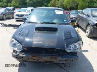 2005 Subaru Impreza WRX z VIN JF1GD29695H512134, wystawiony jako IAAI lot #42508558 z przebiegiem 193 196 mil mil oraz . Historia ofert i sprzedaży dostępna na DreamBid. Obrazek 6.