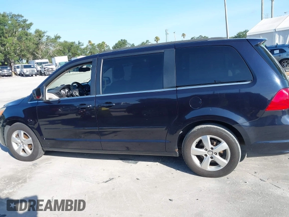 2011 Volkswagen Routan SE with VIN 2V4RW3DG5BR668194, listed as a IAAI auction lot 42483379 with 203,945 mi miles and . Bid and sale history available at DreamBid. Image 14.