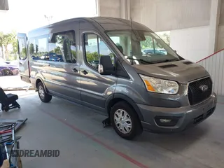 2021 Ford Transit Passenger XL z VIN 1FBAX2C80MKA43264, wystawiony jako IAAI lot #42348321 z przebiegiem 151 706 mil mil oraz . Historia ofert i sprzedaży dostępna na DreamBid. Obrazek 1.