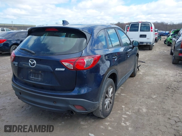 2015 Mazda CX-5 Sport with VIN JM3KE4BY3F0503011, listed as a IAAI auction lot 41973501 with 191,064 mi miles and . Bid and sale history available at carsss.com. Image 4.