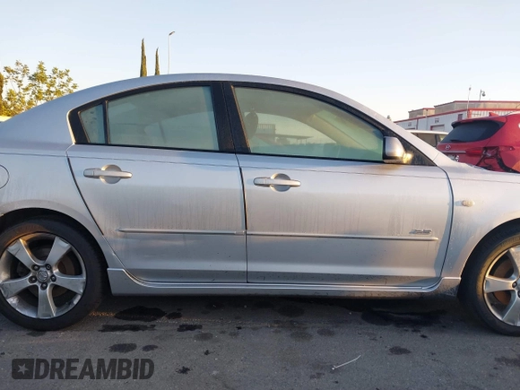 2005 Mazda 3 s with VIN JM1BK323X51247345, listed as a IAAI auction lot 41761337 with 156,060 mi miles. Bid and sale history available at carsss.com. Image 13.