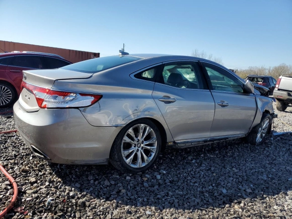 2014 Hyundai Azera с VIN KMHFG4JG6EA354742, выставлен на аукционе Copart как лот 48163345 с пробегом 104 983 миль миль и Списание • Salvage title. История ставок и продаж доступна на DreamBid. Изображение 3.
