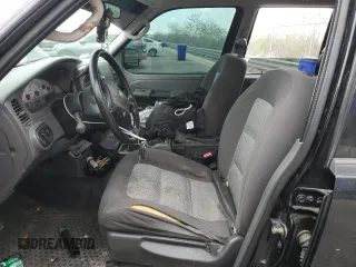 2005 Ford Explorer Sport Trac XLS z VIN 1FMZU67K15UB77562, wystawiony jako Copart lot #59619895 z przebiegiem 122 810 mil mil oraz Szkoda całkowita • Salvage title. Historia ofert i sprzedaży dostępna na DreamBid. Obrazek 7.