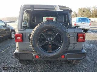 2020 Jeep Wrangler Unlimited Sahara with VIN 1C4HJXENXLW105210, listed as a Copart auction lot 79345214 with 74,480 mi miles and Salvage Title. Bid and sale history available at carsss.com. Image 6.
