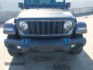 2024 Jeep Wrangler Sport S with VIN 1C4RJXN61RW192386, listed as a IAAI auction lot 42001810 with 7,426 mi miles and . Bid and sale history available at DreamBid. Image 12.